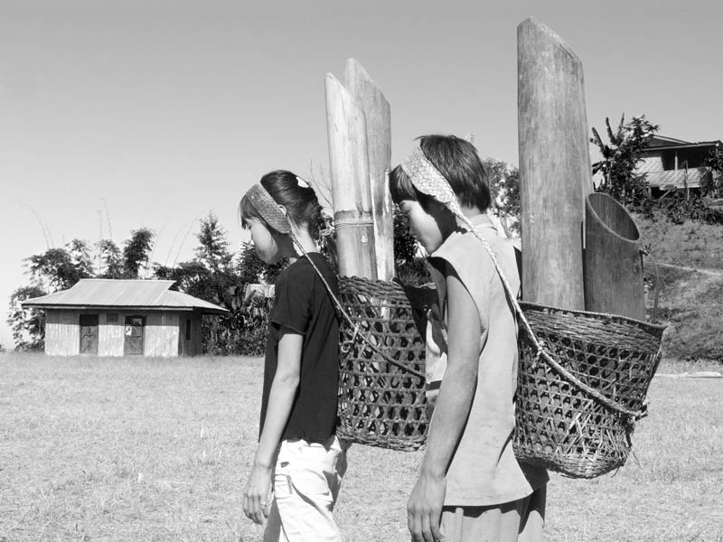 Children and Water - Naga children going to fetch water from a protected spring down the hill in Tuensang district, Nagaland
